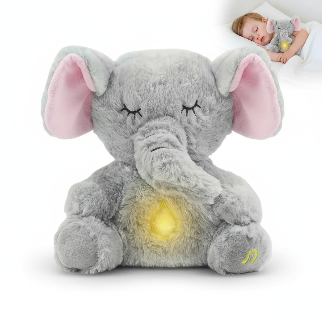 Peluche éléphant gris avec oreilles roses, yeux fermés et lumière douce au ventre, posée assise sur fond blanc