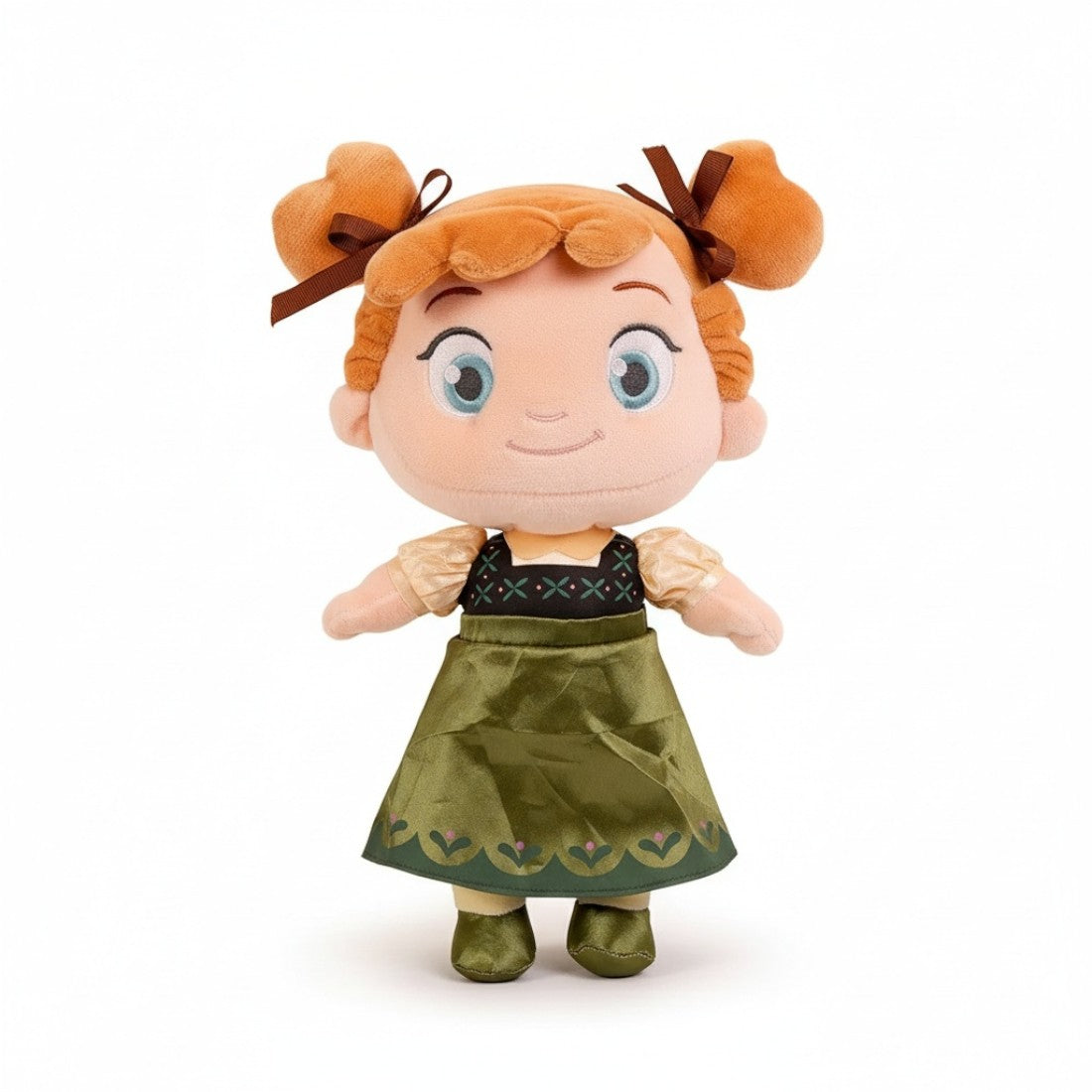 Peluche Anna enfant du film La Reine des Neiges en robe verte et cheveux roux attachés, vue de face sur fond blanc.