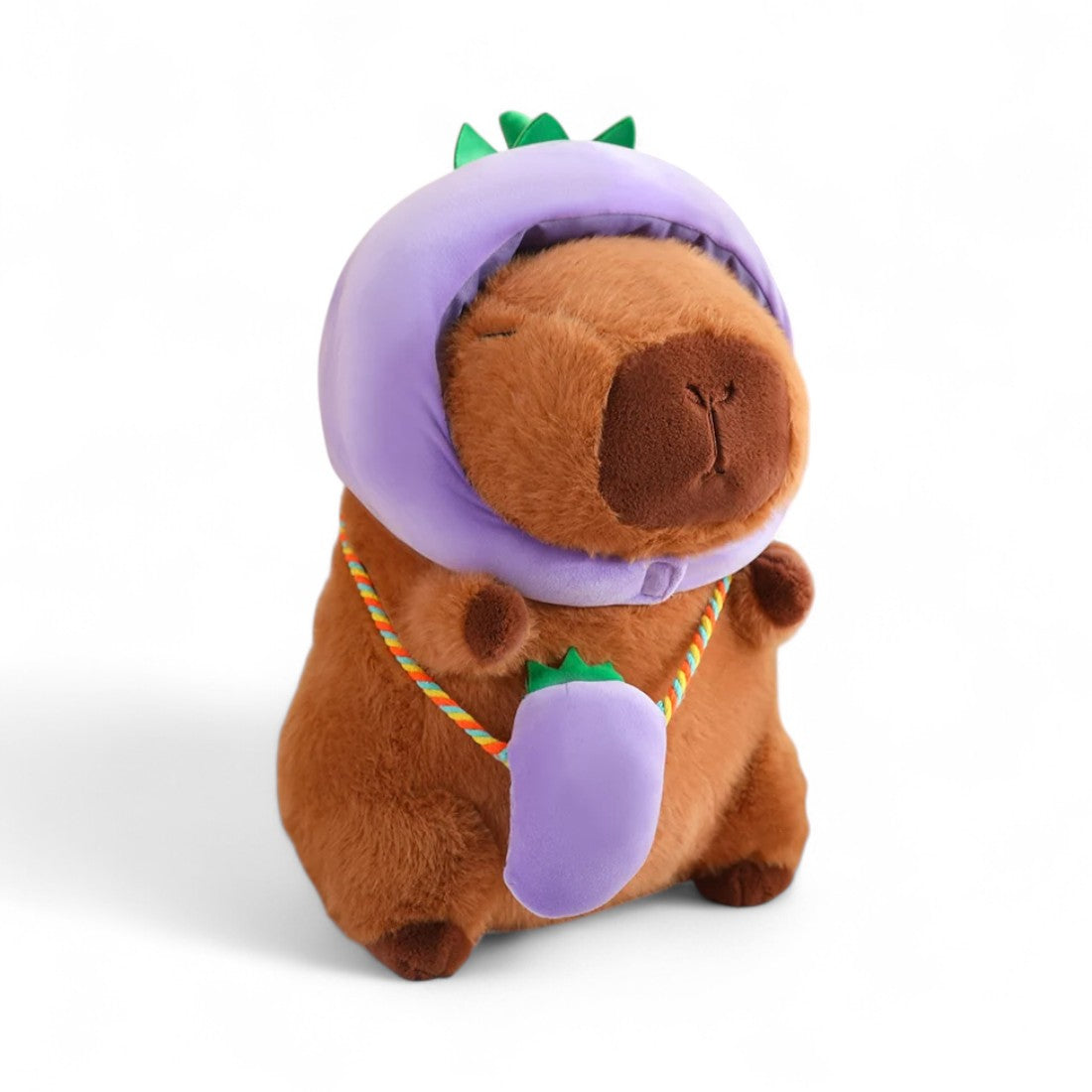Peluche Capybara avec chapeau et sac légume