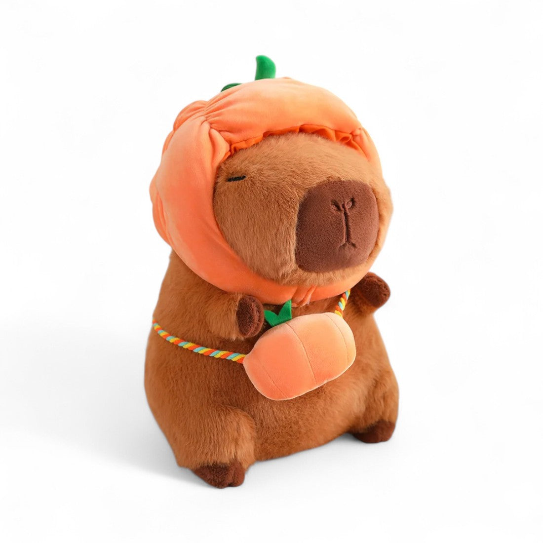 Peluche Capybara avec chapeau et sac légume
