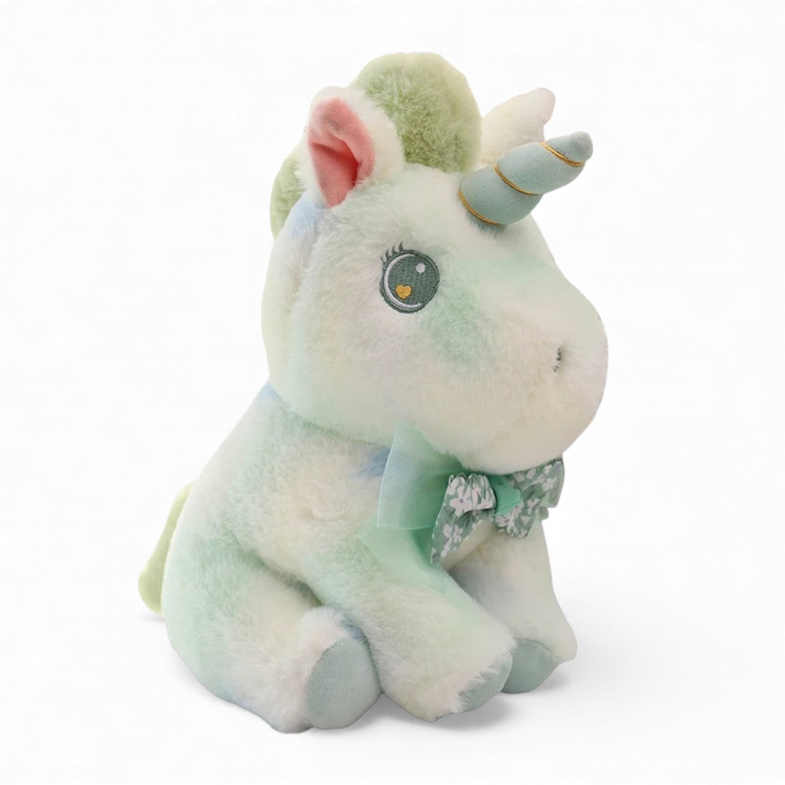 Peluche licorne pastel pour enfant avec nœud fleuri