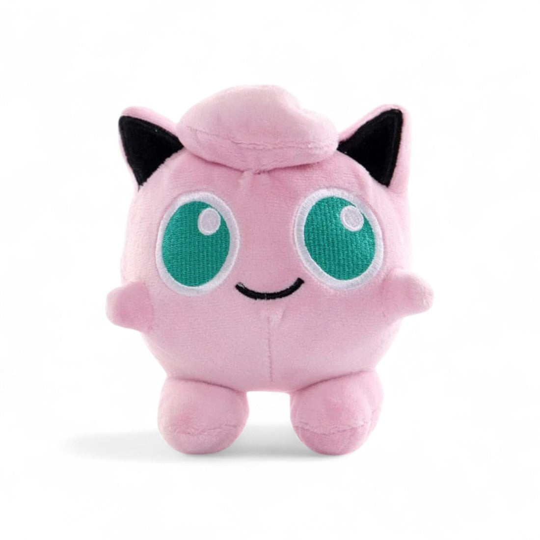 Peluche Pokémon Rondoudou rose avec grands yeux verts, vue de face sur fond blanc.