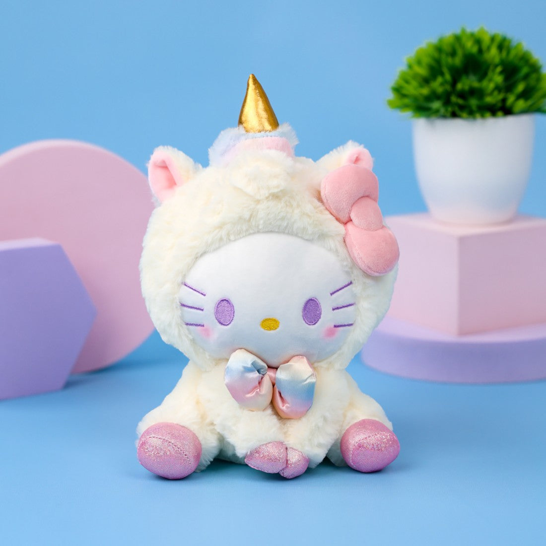 Peluche Hello Kitty déguisée en licorne arc-en-ciel