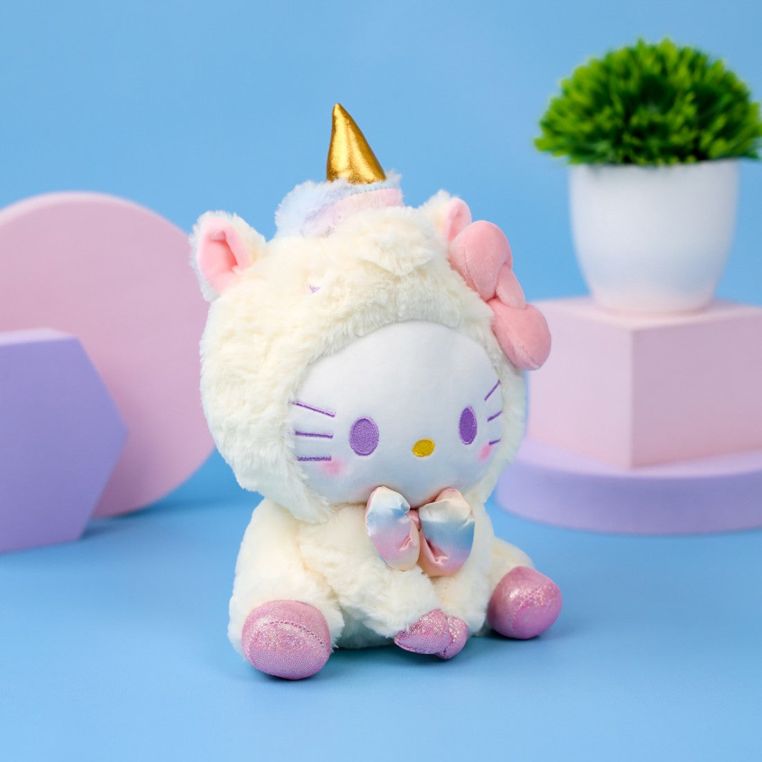 Peluche Hello Kitty déguisée en licorne arc-en-ciel