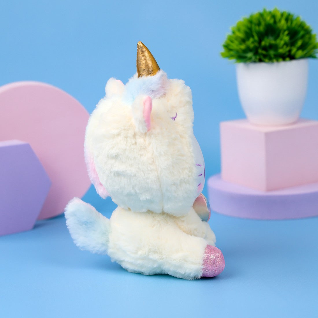 Peluche Hello Kitty déguisée en licorne arc-en-ciel