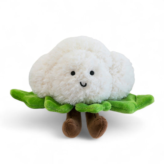 Peluche kawaii représentant un chou-fleur blanc moelleux, avec des feuilles vertes en tissu et des petites jambes marron souriantes, sur fond blanc.