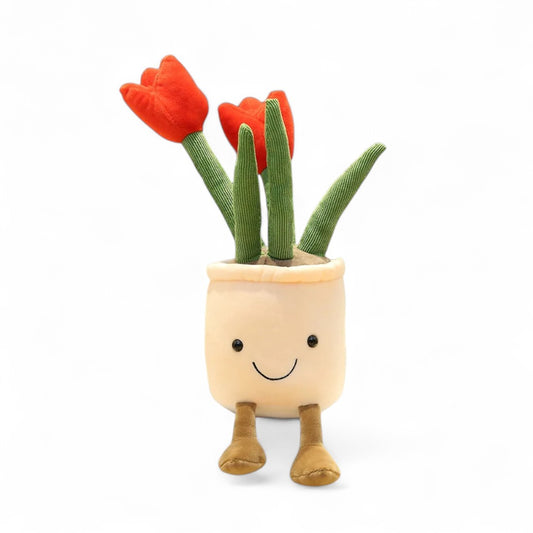 Peluche représentant des tulipes en pot souriante blanc, avec des pieds marron,  sur fond blanc.