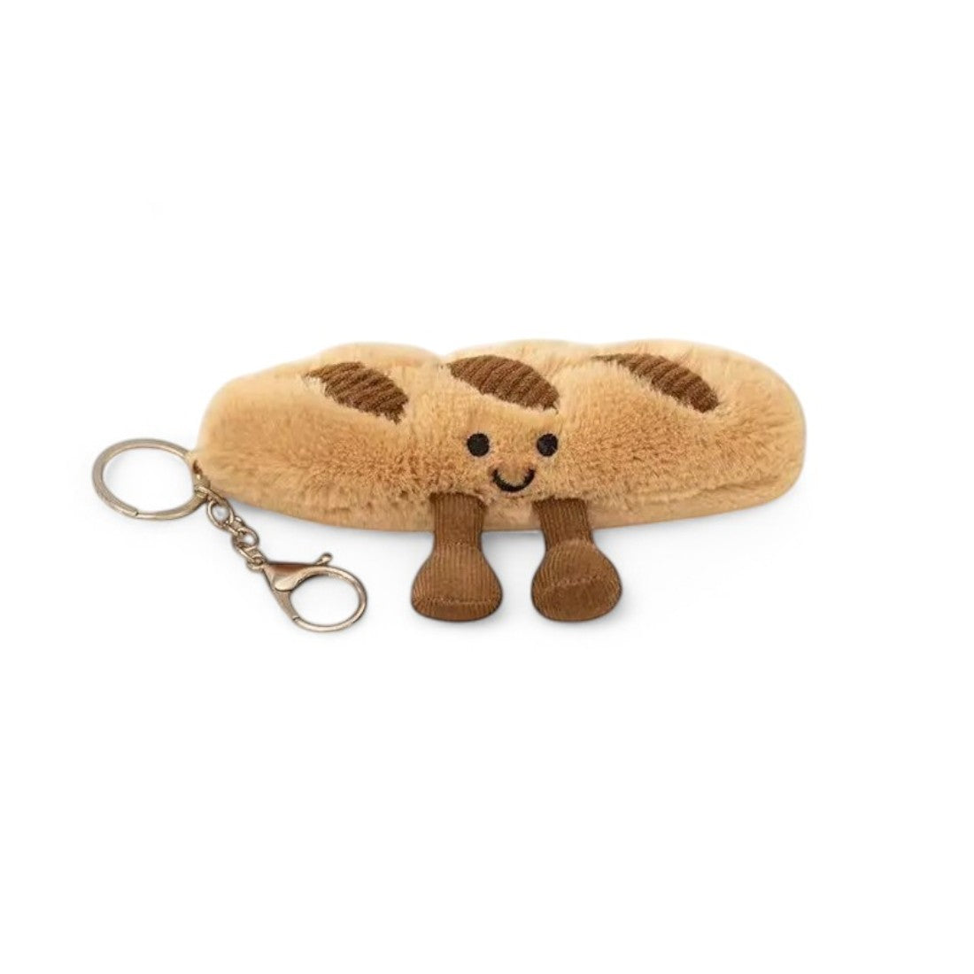 Peluche kawaii en forme de baguette de pain, avec visage souriant, petites jambes marron et attache porte-clés, sur fond blanc.