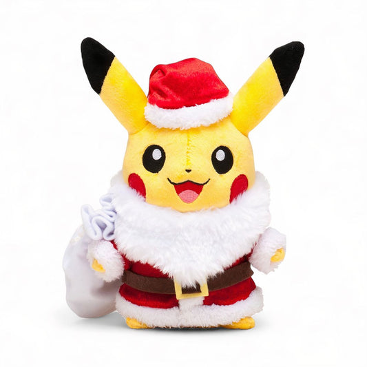 Peluche Pikachu déguisé en Père Noël, avec bonnet rouge et hotte à cadeau, debout sur fond blanc.