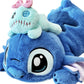 Peluche Stitch allongé avec doudou de Lilo