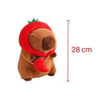Peluche Capybara avec chapeau et sac légume