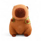 Capybara en peluche avec sac à dos tortue