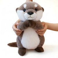Loutre en peluche attendrissante
