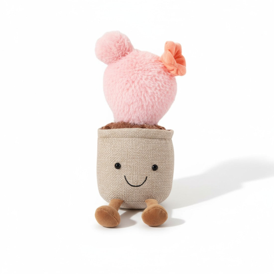 Peluche plante cactus rose en pot souriant avec petite fleur