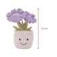Peluche plante kawaii pot fleurs violettes