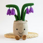 Peluche plante kawaii pot fleurs violettes