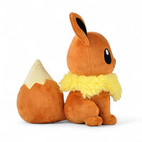 Peluche Pokémon - Évoli adorable - vue de profil avec la queue