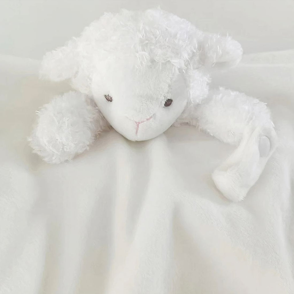 Doudou mouton blanc porte-tétine pour bébé