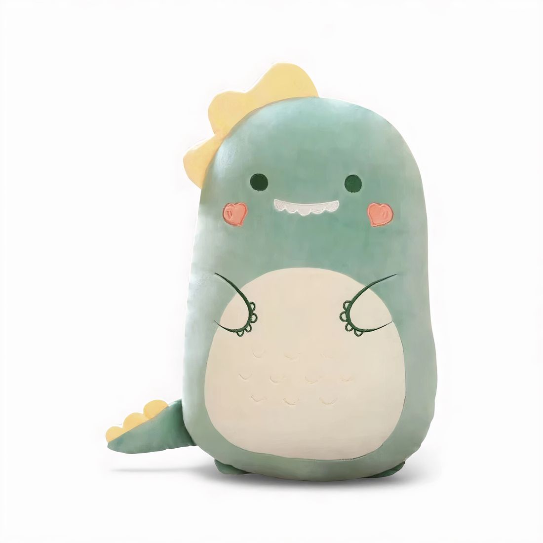 Coussin peluche avec grand ventre crème, petites pattes brodées, crêtes jaunes sur la tête et la queue, souriant, posé sur fond blanc.