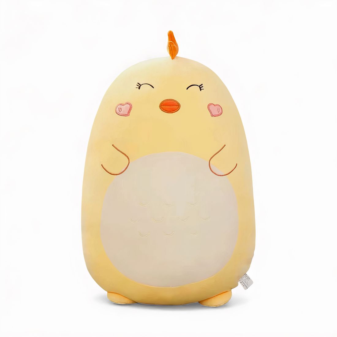 Grand coussin peluche poussin jaune, 45 cm, ventre crème, yeux fermés, joues en forme de cœur et petit bec orange, posé sur un canapé clair.