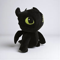 Peluche Dragon Krokmou expression rigolote - vue de trois-quarts sur fond gris
