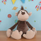Peluche singe malicieux
