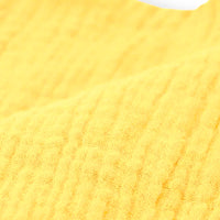 Peluche doudou lion jaune en gaze de coton