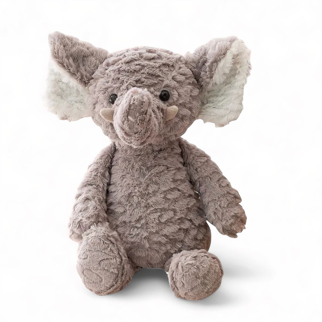 Élément en peluche gris, grandes oreilles blanches, yeux noirs brillants, assis sur fond blanc.