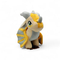 Peluche dragon féérique gris doré lumineux - vue de trois-quarts avant, aile repliée