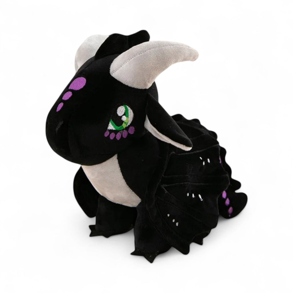 Peluche dragon féérique noir crépuscule - vue de trois-quarts, en position assise