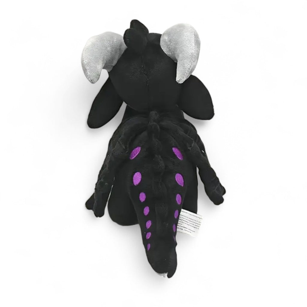 Peluche dragon féérique noir crépuscule - vue de dos, crête et queue