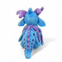 Peluche dragon féérique violet éclatant - vue de dos, crête et queue