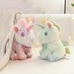 Peluche licorne pastel pour enfant avec nœud fleuri