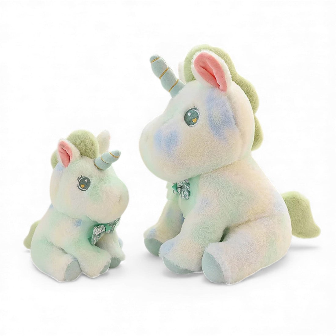 Peluche licorne pastel pour enfant avec nœud fleuri