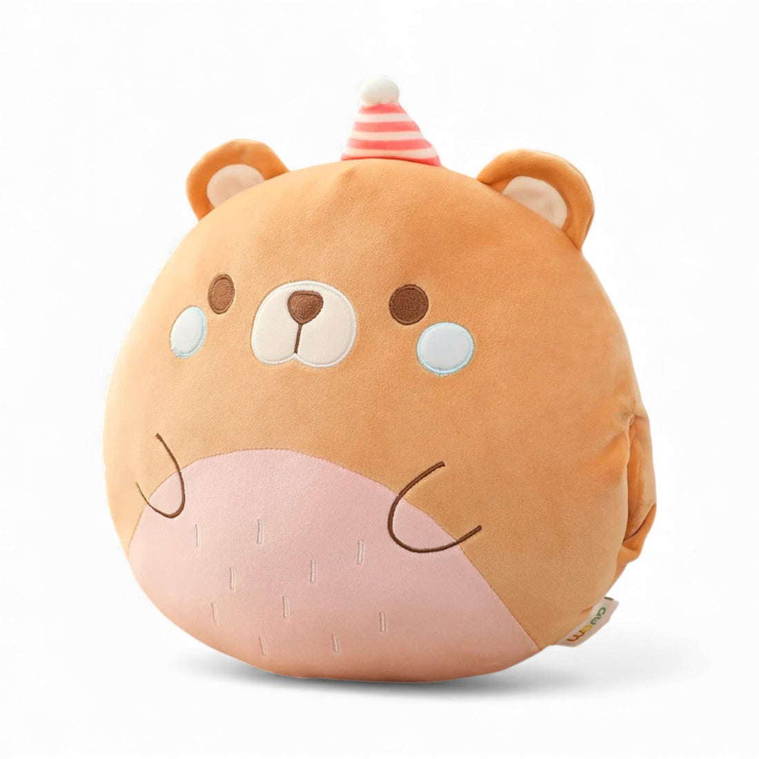 Peluche coussin rond reprensentant un  ours orange avec un ventre rose, un visage et des petits bras brodés, des oreilles ronde sur la tête ; posée sur fond blanc