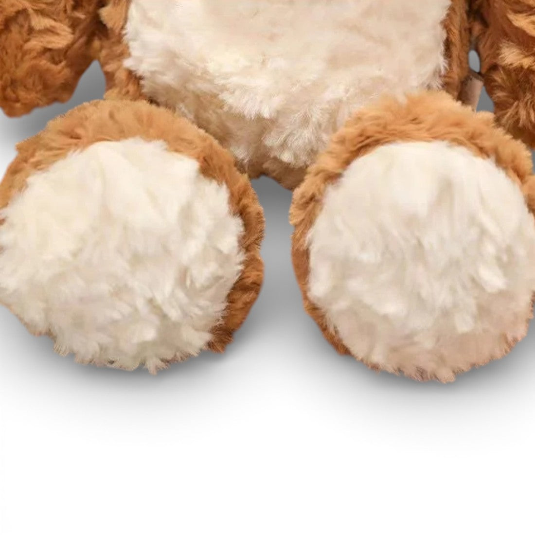 Peluche ours chaleureux brun clair