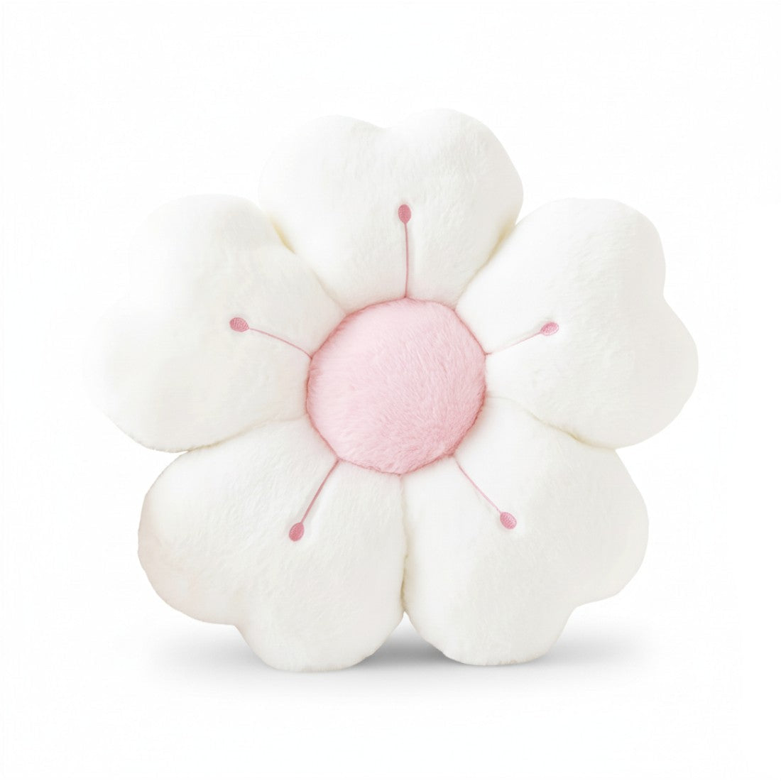 Peluche coussin en forme de fleur duveteuse blanche avec cœur rose, pétales moelleux et centre rond, posé sur fond blanc uni.