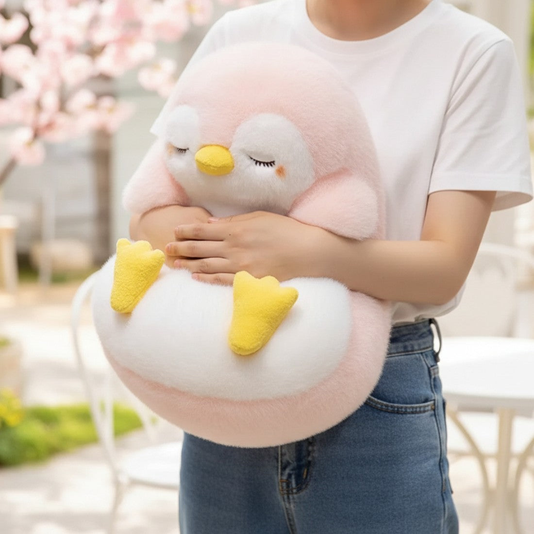 Peluche pingouin moelleux endormi