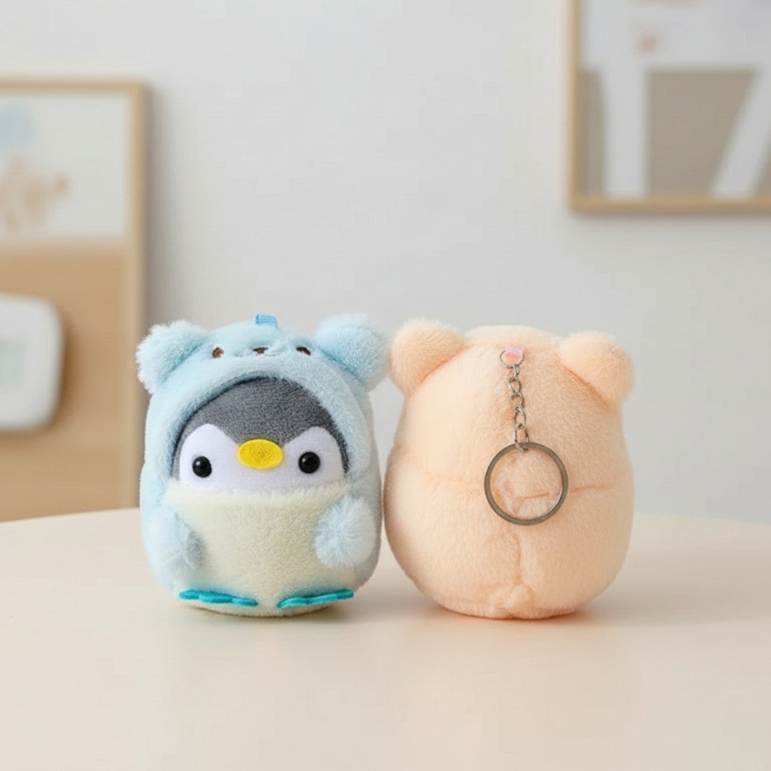 Porte-clés pingouin déguisé en ourson