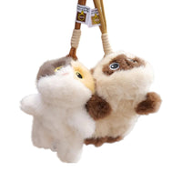 Peluche petit chat trop craquant - deux coloris suspendus à leur cordon