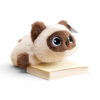 Peluche petit chat trop craquant - modèle siamois posé sur un livre
