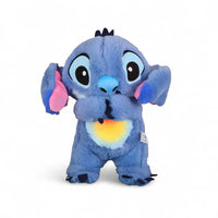 Peluche respirante Stitch veilleuse magique - ventre lumineux allumé, vue de face