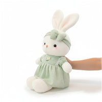 Adorable lapin en peluche avec robe à fleurs