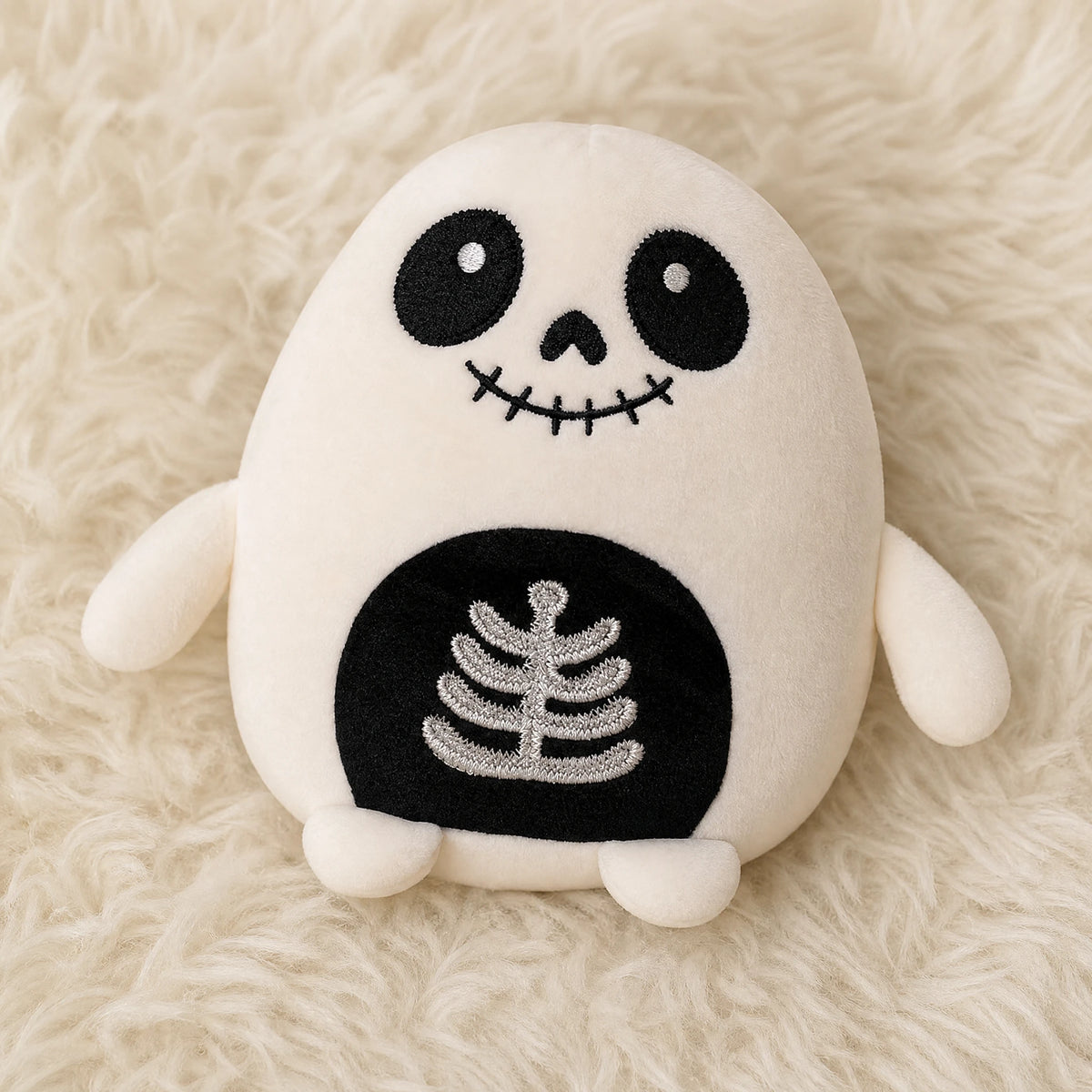 Les peluches rondes d'halloween : Squelette - Détail matière
