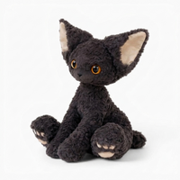 Lockiges schwarzes Katze Kuscheltier - Fond blanc angle